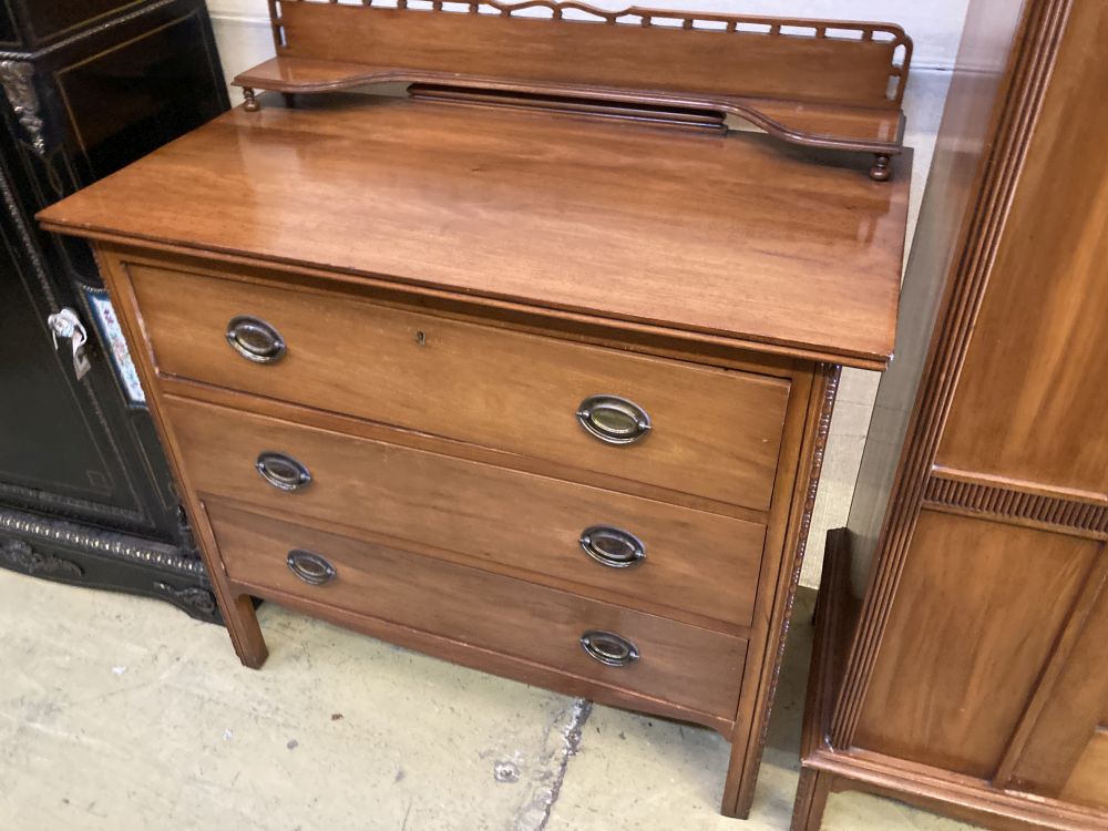 An Edwardian satin walnut three piece bedroom suite, wardrobe width 96cm, depth 43cm, height 196cm